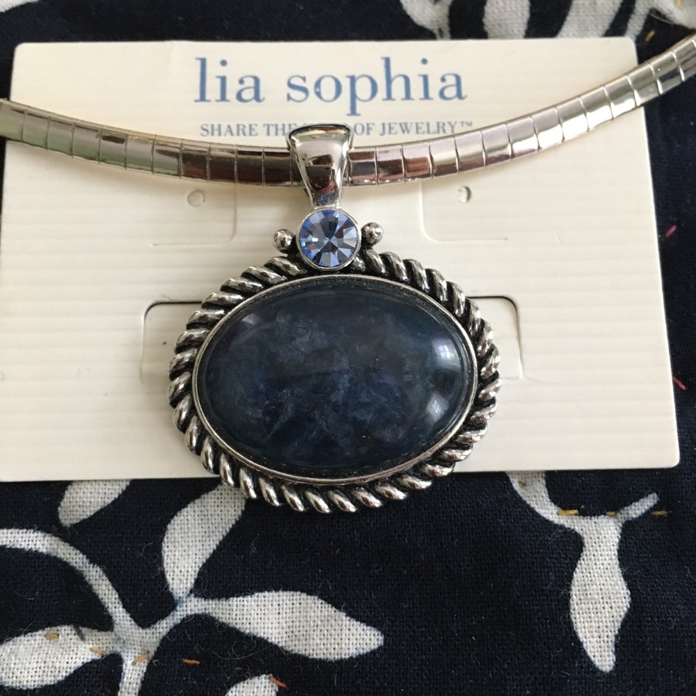 A unique necklace that is both silver and gold.